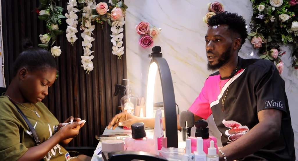 A manicurist calls for establishment of training centers to train youth