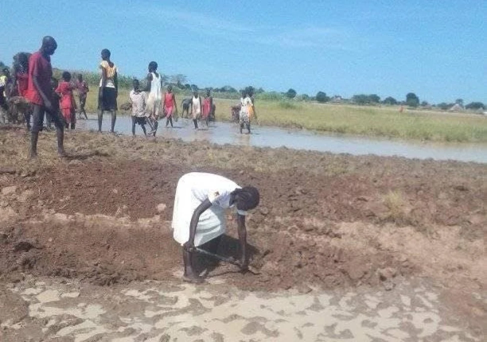 Panthou community builds road to health center